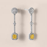 Fancy Intense Yellow Radiant-Cut Diamond and White Diamond Drop Earrings