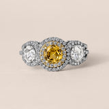 Fancy Intense Yellow Diamond Three-Stone Halo Ring