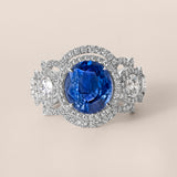Unheated Sapphire and Diamond Double Halo Three-Stone Ring